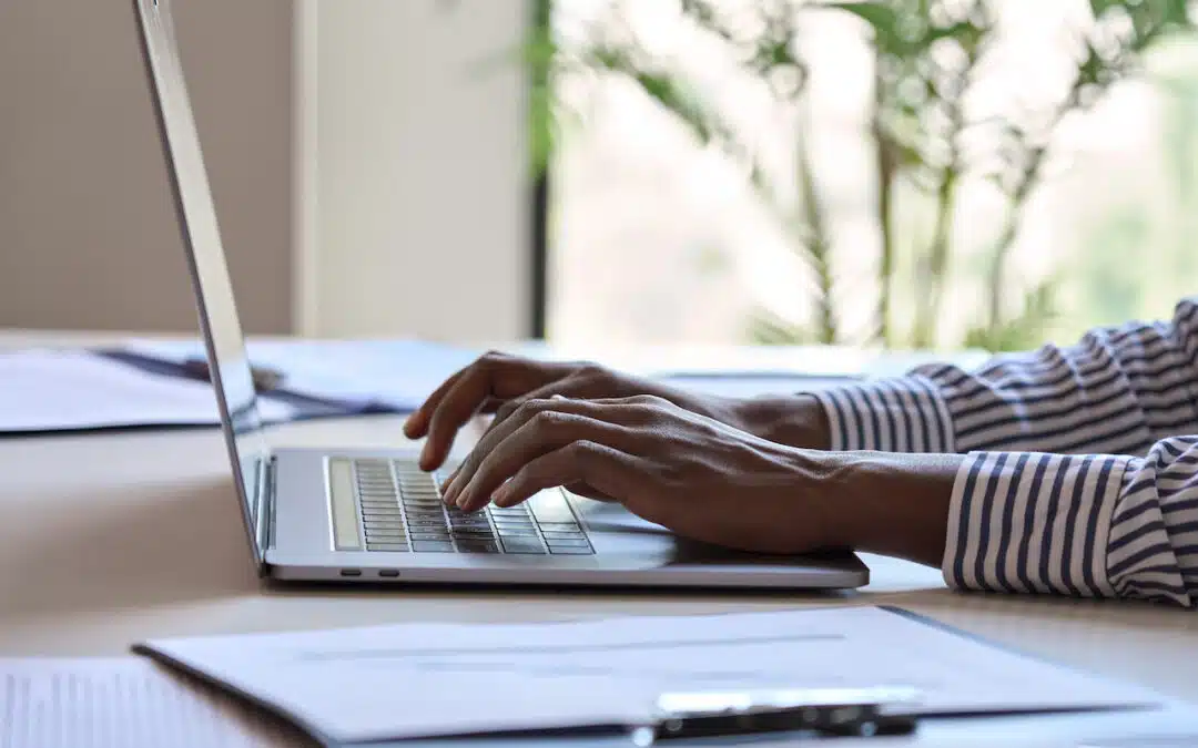 man on laptop trying to prevent ransomware